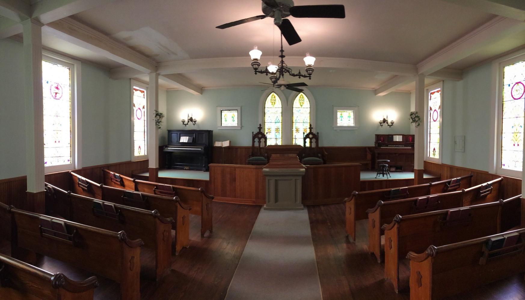 Historic church interior at Americana Village