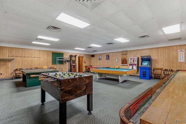 Pool table and foosball in The Tepee game room